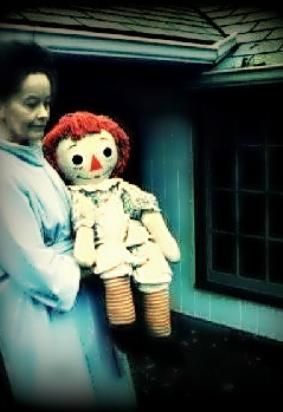 Lorraine Warren carrying the demonic Annabelle doll