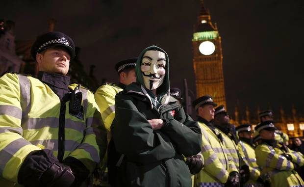 Riot police on alert for bonfire night 'Million Mask March' by activists Anonymous