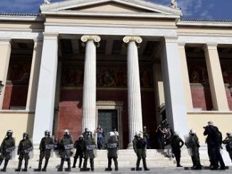 Greek riot police and protesters clash in Athens