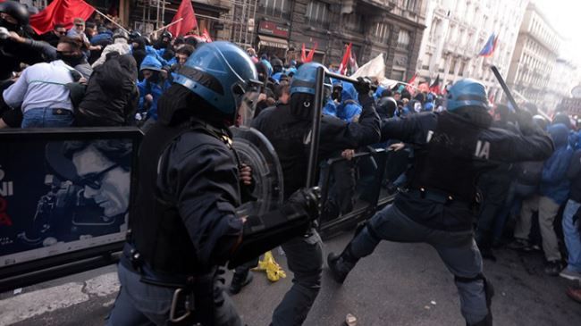 Police and anti-government protesters clash in Italy