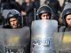 Police fire tear gas as Mubarak verdict brings protests to Tahir Square in Cairo