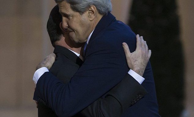 US woos France with hugs and kisses to make up for snubbing terror march
