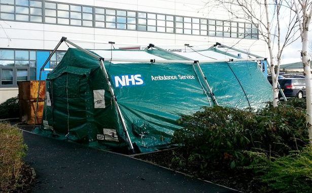 Hospital forced to erect TENT in car park as non urgent operations are cancelled