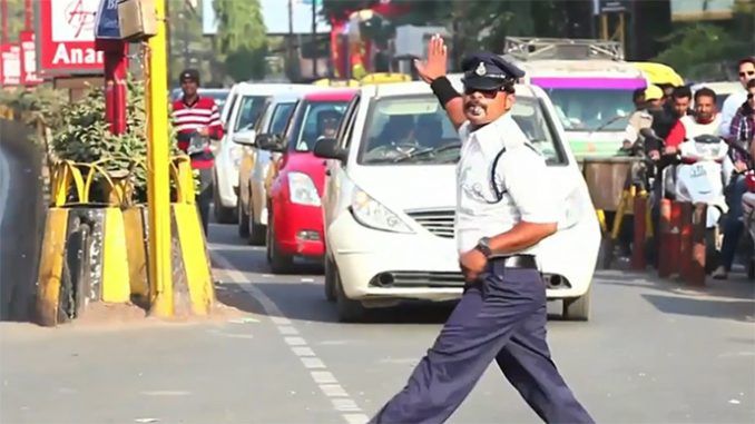 Is this MOONWALKING traffic cop in India the next Michael Jackson?