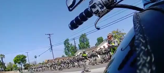 Armed Troops Patrolling Residential Streets
