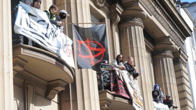 Police In Liverpool Accused Of Trying To Starve Activists Out Of Occupied Bank
