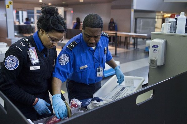 TSA agent at JFK airport caught stealing money from passengers