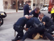 Video of nine LA cops slamming unnarmed black teenager to ground for 'jaywalking'