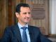 Syria's President Bashar al-Assad answers questions during an interview with al-Manar's journalist Amro Nassef, in Damascus