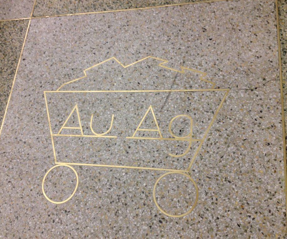 Denver International Airport AU AG symbol on the ground