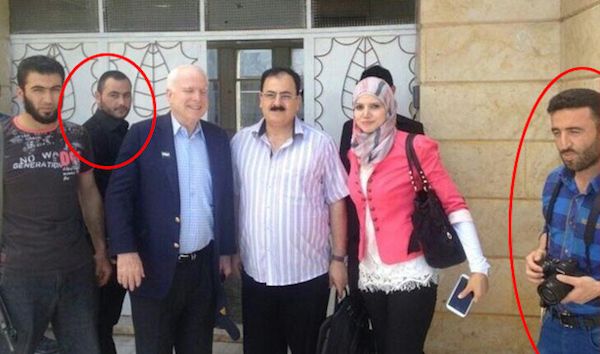 Senator John McCain with ISIS Chief Abu Bakr Al-Baghdadi (circled left) and terrorist Muahmmad Noor (circled right).