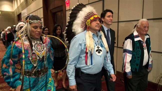 Trudeau and Aboriginal dancers