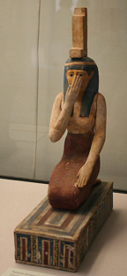 Fig. 15 Ancient Egyptian statue of Isis on her knees