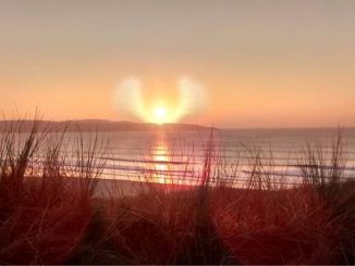 Angel Cloud Formation Appears In The Sky Above Beach In Cornwall
