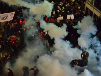 Turkish police fire tear gas at protestors outside Zaman newspaper building