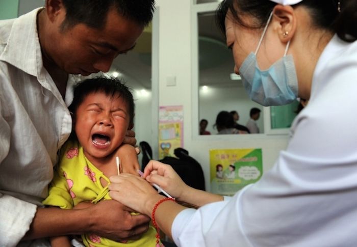 Vaccine scandal rocks China as citizens accuse government of 'genocide'