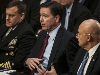 Why does FBI Director James Comey put tape over his webcam?