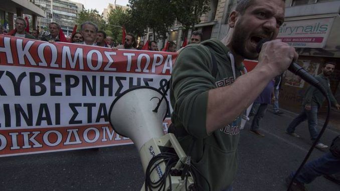 Thousands Protest As Greek Parliament Adopts New Austerity Measures