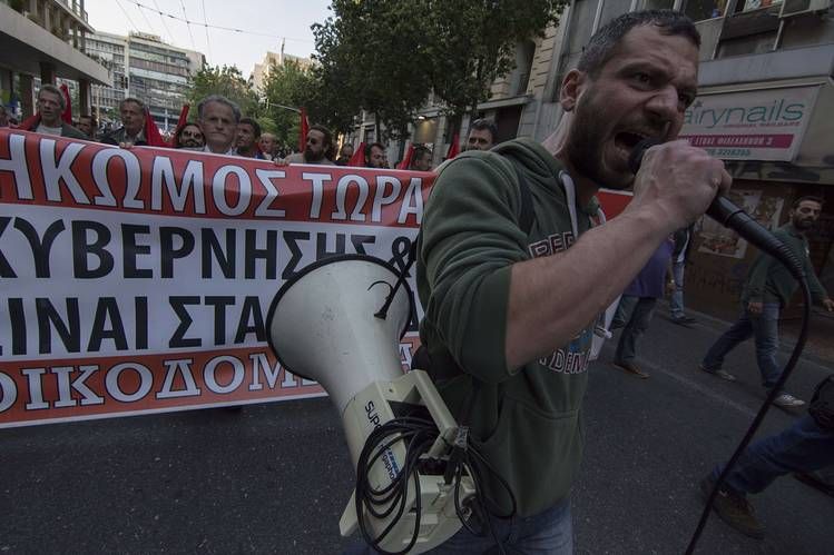 Thousands Protest As Greek Parliament Adopts New Austerity Measures