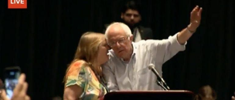 After Bernie Sanders’ speech to his delegates, his wife Jane Sanders got on stage with him and whispered in his ear, over a hot mic, "They don’t know your name is being put in nomination. That’s what concerns."