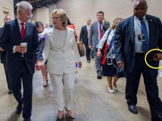 Evidence has emerged that Hillary’s handler - a man who carries what looks like a medical lapel-pin - always has an auto-injector syringe with Diazepam on hand.