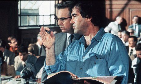 Oliver Stone with Kevin Costner on the set of JFK. Stone said he believed the agent because of his 'jargon' and 'intricate detail.'