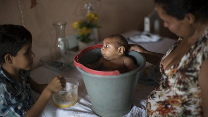 Doctors claim that the addition of a toxic pesticide to Brazil's drinking water is to blame for the increase in birth defects - not the Zika virus.