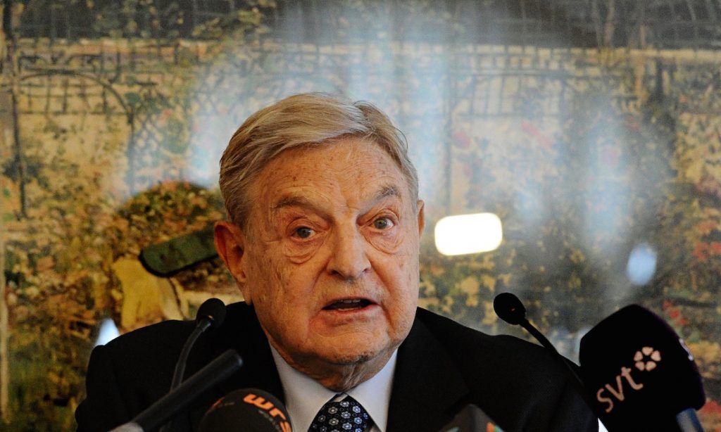 George Soros warns Europeans that they must accept refugees or face extinction
