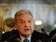 George Soros warns Europeans that they must accept refugees or face extinction