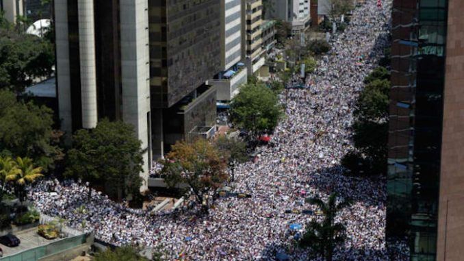 Thousands take to the streets in Venezuela amid a country-wide revolution