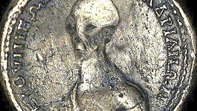 The discovery of an ancient Egyptian coin depicting an alien-like creature is proof that UFOs and aliens have visited Earth, researchers say.