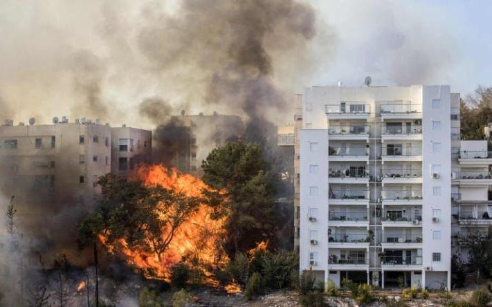 Tens Of Thousands Evacuated As Wildfires Rage In Israel
