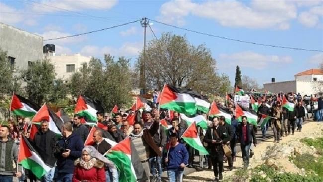 Palestinians stage an anti-Israeli demonstration in Bil’in near the West Bank city of Ramallah on February 17, 2017. (Photos by Ma’an)