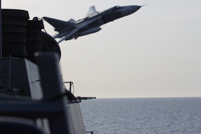 Russian fighter jet shoots at US destroyer putting military on 'red alert'