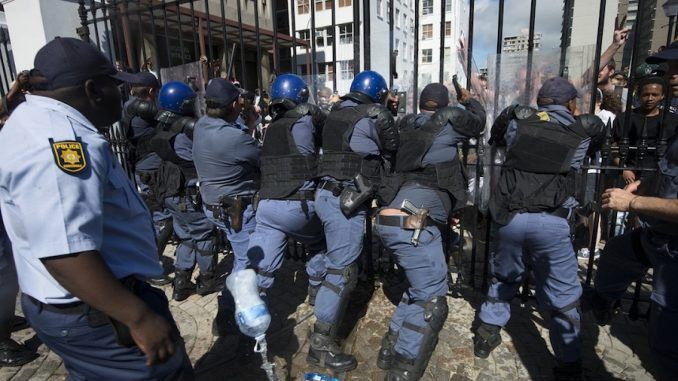 South Africa is teetering on the brink of a race war after President Jacob Zuma called on parliament to pass a law allowing white-owned land to be "confiscated" by blacks without any form of compensation.