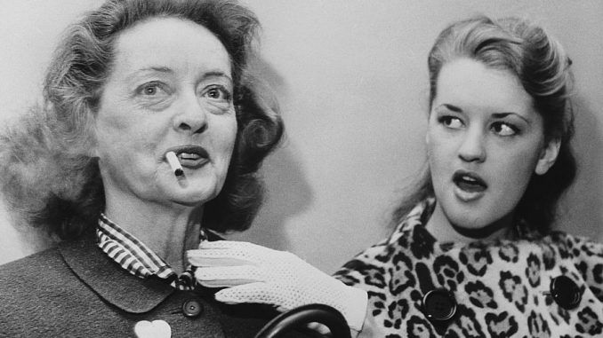 Bette Davis' eldest child, born-again Christian, B.D. Hyman, claims her famous mother practicing witch who put 'demonic' curses on her enemies and family.