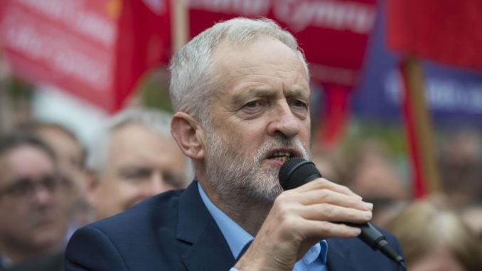 British opposition leader, Jeremy Corbyn, says he will suspend UK involvement in Syria air strikes if elected.