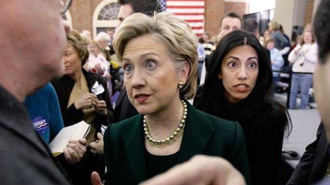 Two of Huma Abedin's cousins have been arrested and she has been named, along with Hillary Clinton's State Department, in a US Department of Justice prosecution