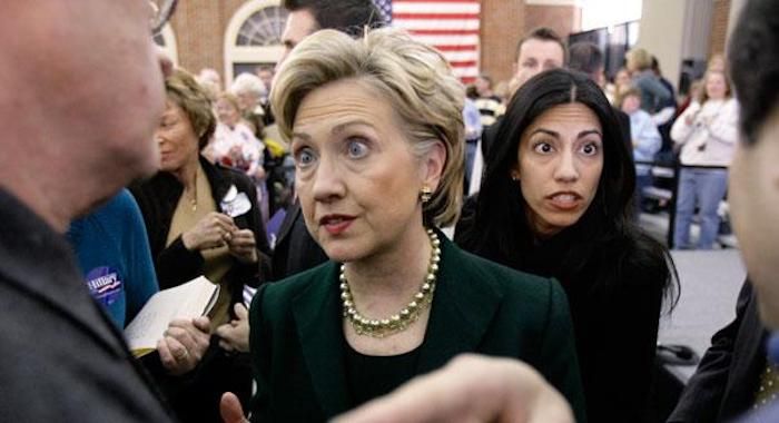 Two of Huma Abedin's cousins have been arrested and she has been named, along with Hillary Clinton's State Department, in a US Department of Justice prosecution