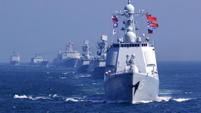 The Chinese Navy has put the US military on notice, warning them to remove a US warship patrolling the South China Sea, or face consequences.