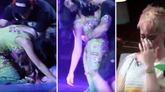 Footage has emerged of Katy Perry collapsing and being dragged off stage after an incoherent rant, as insiders warn she is set to be the latest Illuminati controlled celebrity to suffer a public meltdown.