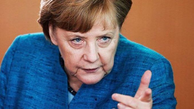 Angela Merkel blasts Trump over his Mexico wall plans