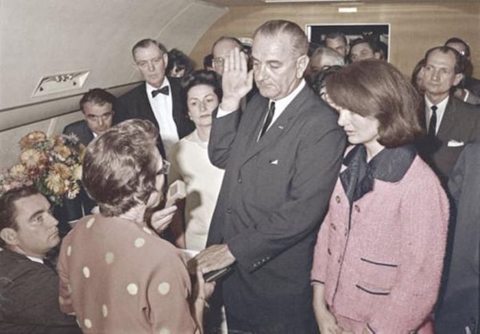 Jackie Onassis wore her bloodstained dress to Lyndon B. Johnson's emergency swearing in ceremony “ to shame" him, according to the JFK files.