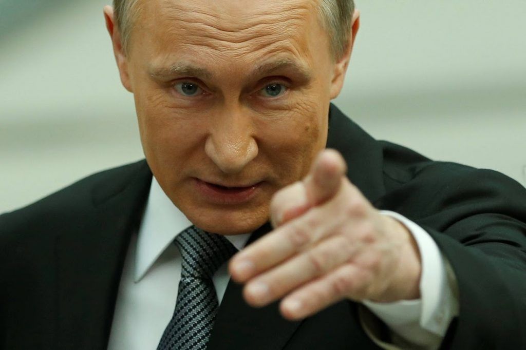 Putin accuses US of hacking Russian elections