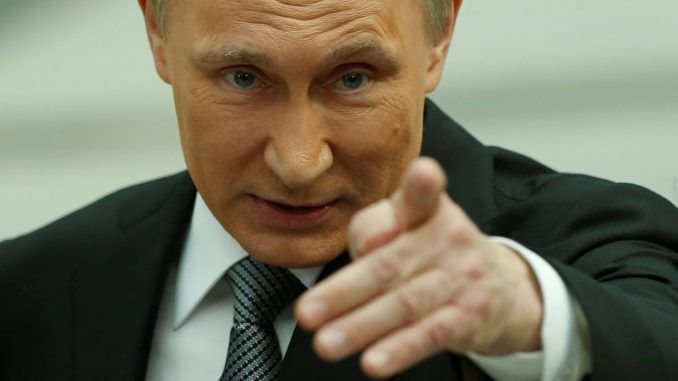 Putin accuses US of hacking Russian elections