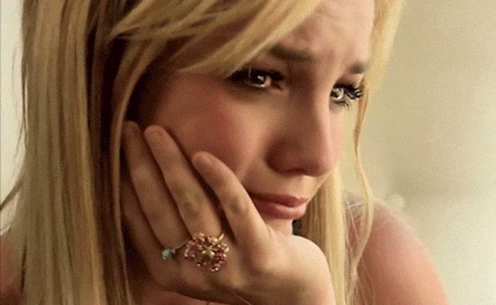 Britney Spears has told close friends that she prays to God every night asking him to forgive her for associating with the Illuminati.