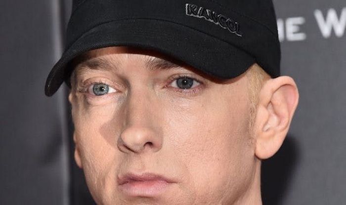 Eminem says he is so "embarrassed" being white that its making him want to commit suicide because he "can't escape" his own race.