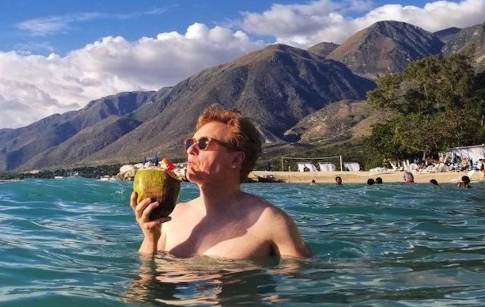 A member of Conan O'Brien's production crew was mugged in Haiti while the talk show host was filming a show designed to prove Haiti is safe.