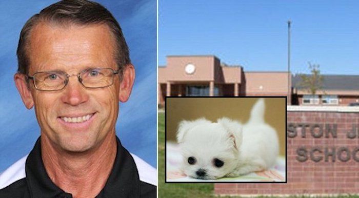 A science teacher in Idaho is under investigation after he was caught feeding a live puppy to one of his pet reptiles in front of students.