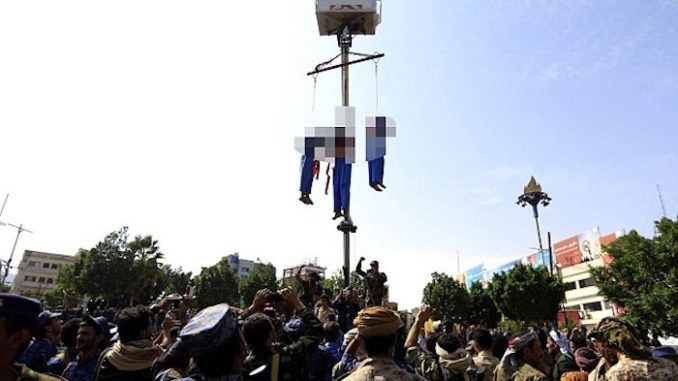 Three pedophiles were publicly executed and hanged from cranes after they were found guilty of brutally raping and killing a 10-year-old boy.